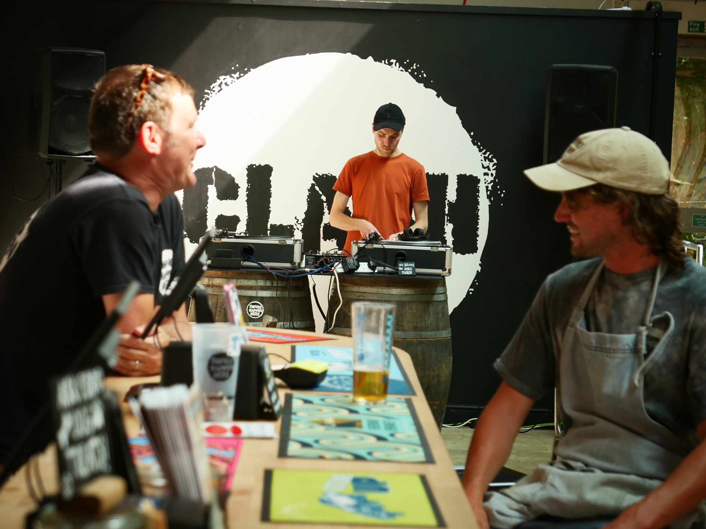 DJ session and guests at CLASH Taproom
